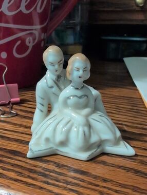This item is a vintage ceramic figurine of a romantic couple Wedding Cake Topper